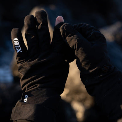 OTEX Photography Gloves worn by a photographer